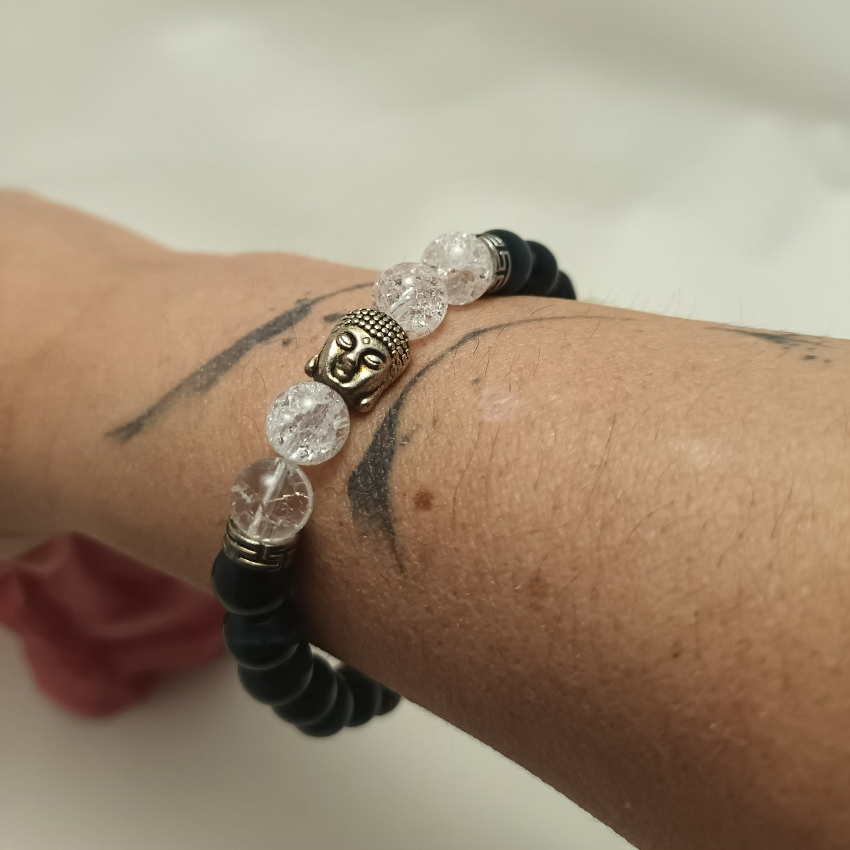 Bracelet œil de faucon et cristal de roche 8 mm - breloques acier inox - élastique 17,5 cm