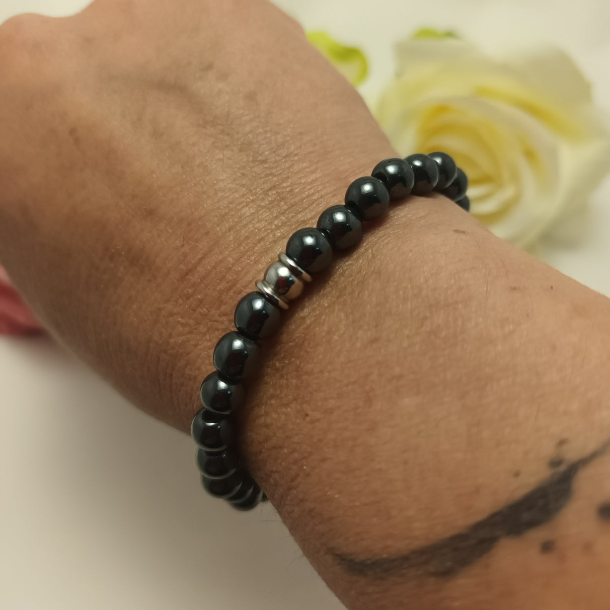 Bracelet hématite magnétique 6 mm - perle acier inox - élastique 15 cm