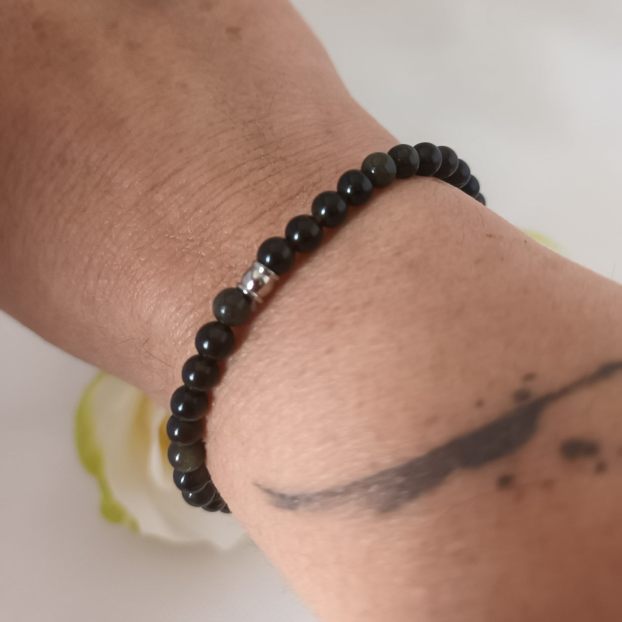 Bracelet obsidienne dorée 4 mm - perle acier inox - élastique 16 cm