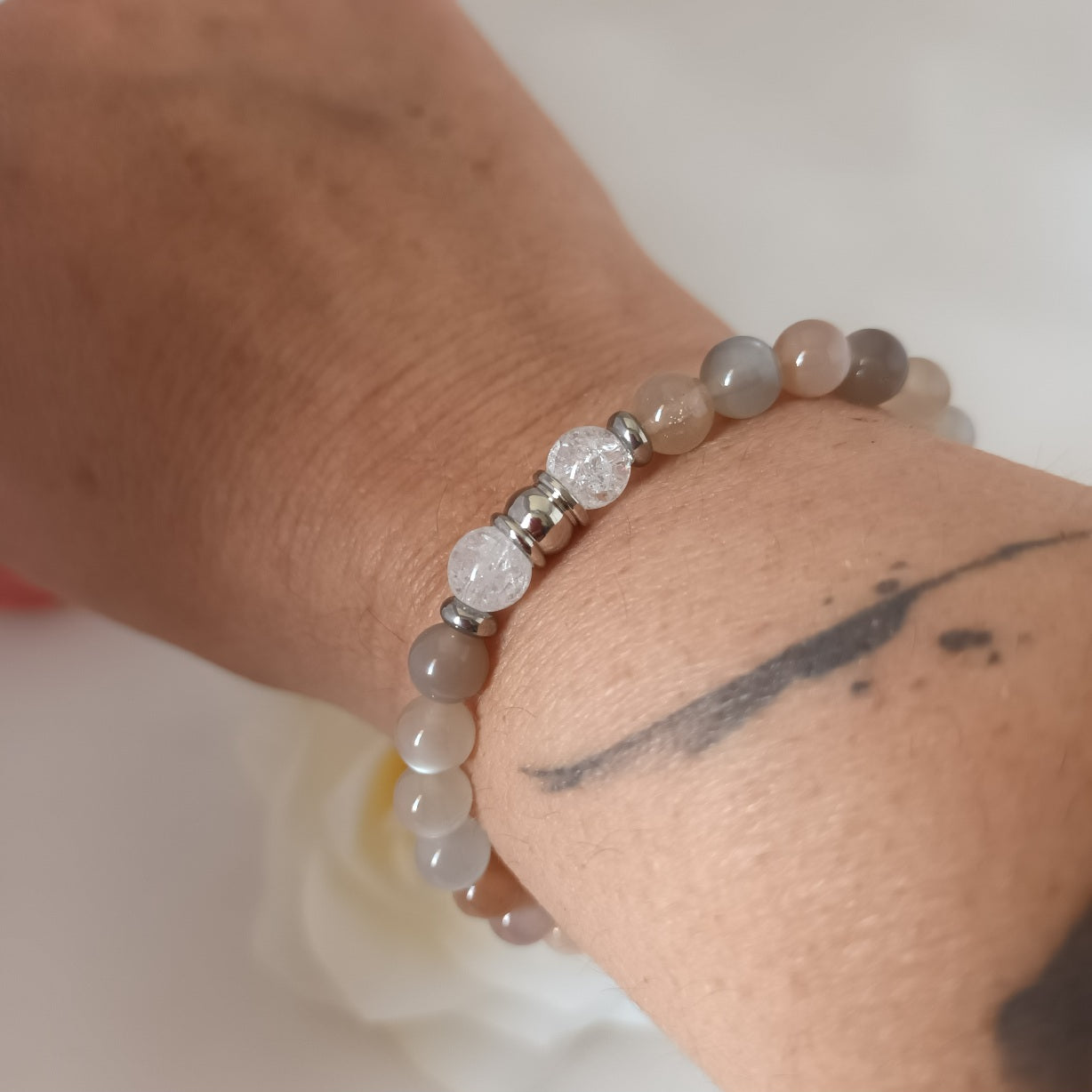 Bracelet pierre de lune multicolore et cristal de roche 6 mm - perles acier inox - élastique 15 cm