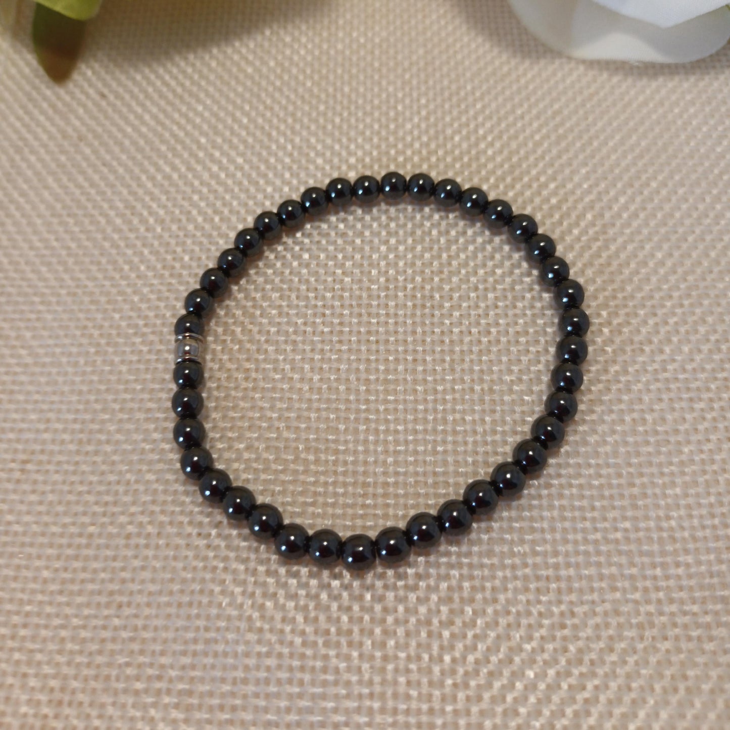 Bracelet hématite 4 mm - perle acier inox – élastique 15 cm
