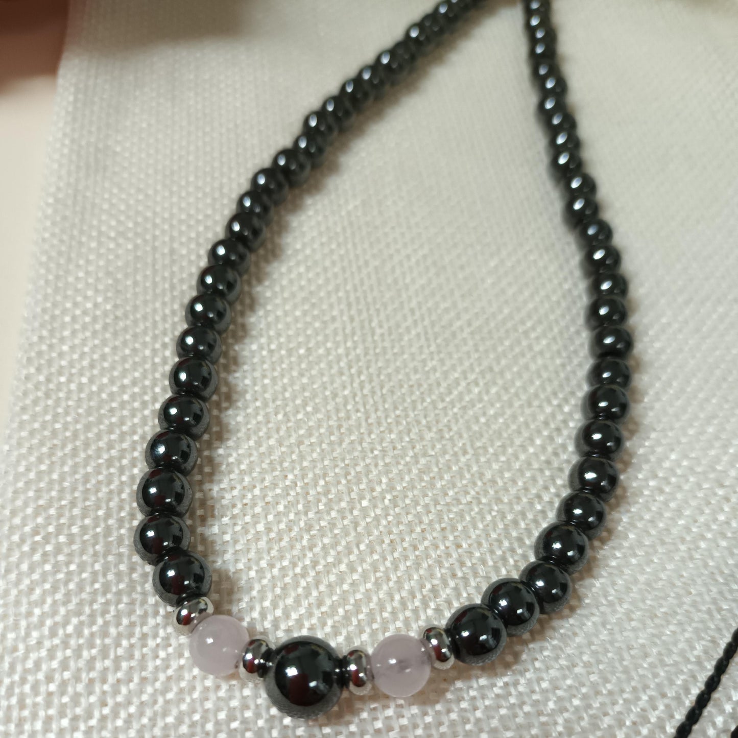 Collier hématite magnétique et quartz rose – perles inox – lien réglable