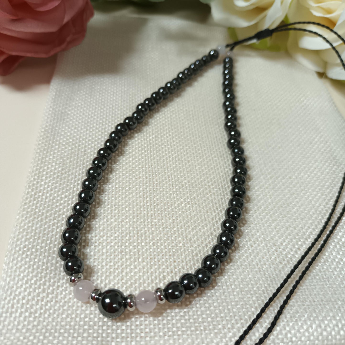 Collier hématite magnétique et quartz rose – perles inox – lien réglable