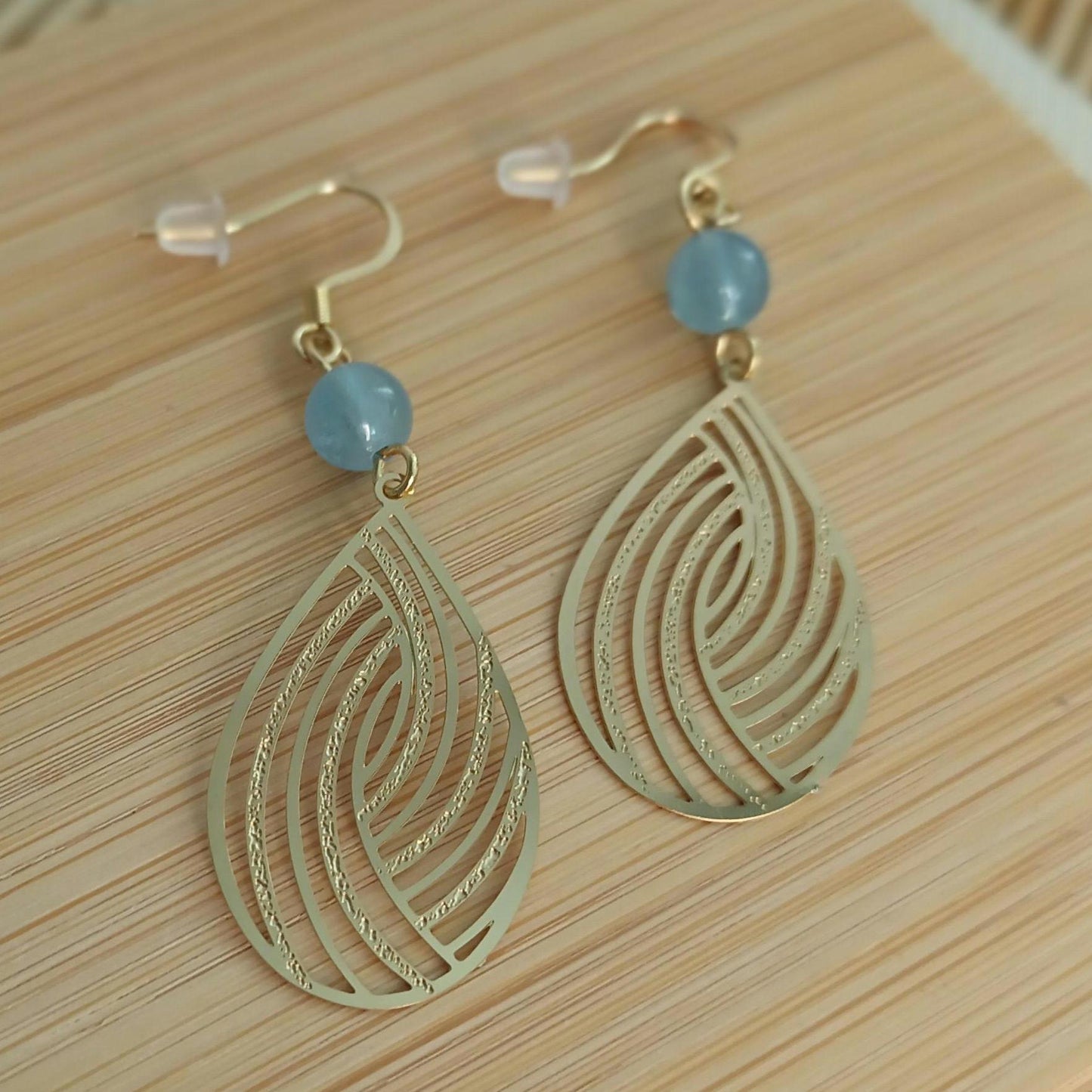 Boucles d’oreilles aigue‑marine – pendantes 5,6 cm – acier inoxydable doré