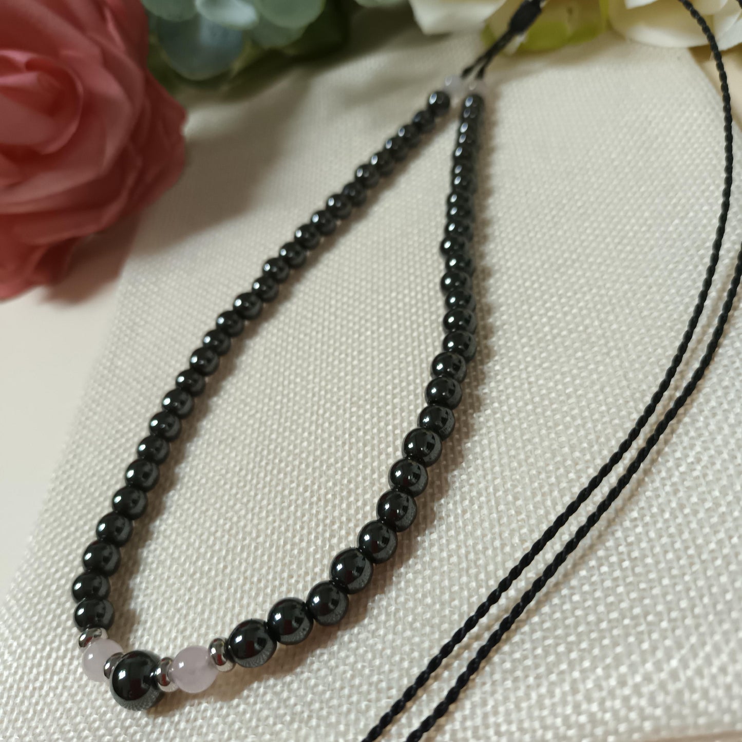 Collier hématite magnétique et quartz rose – perles inox – lien réglable