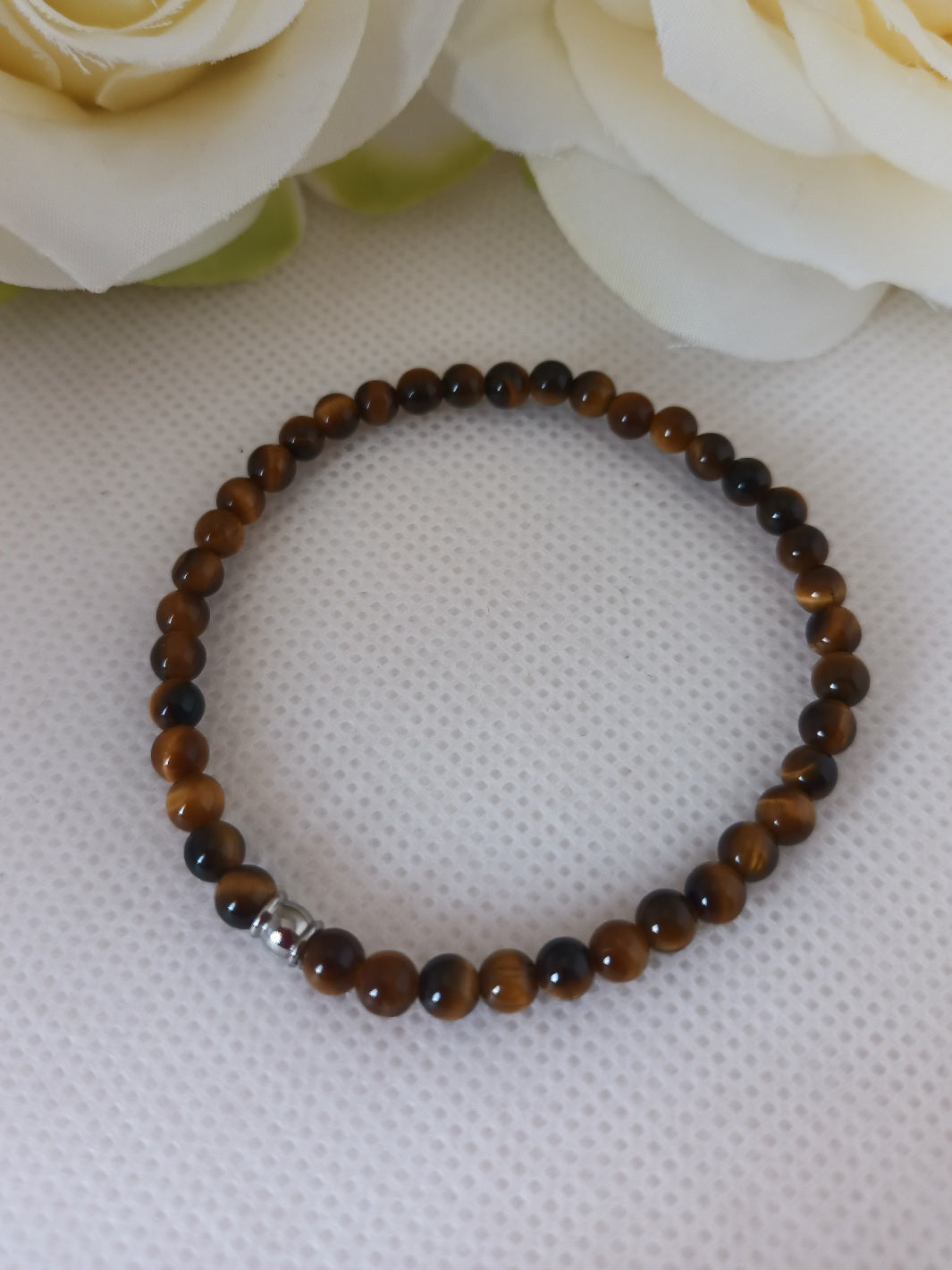 Bracelet œil de tigre 4 mm - perle acier inox - élastique 15 cm