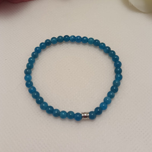 Bracelet apatite bleue 4 mm - perle acier inox - élastique 15 cm