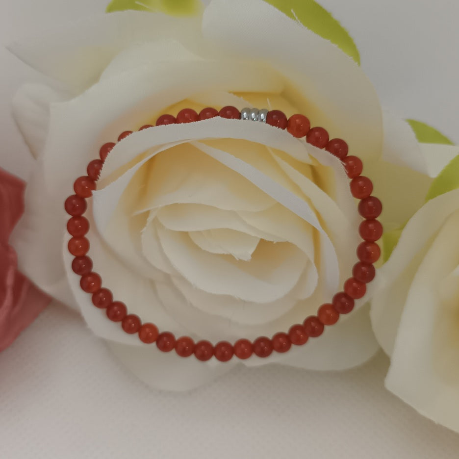 Bracelet cornaline 4 mm - perle acier inox - élastique 15 cm