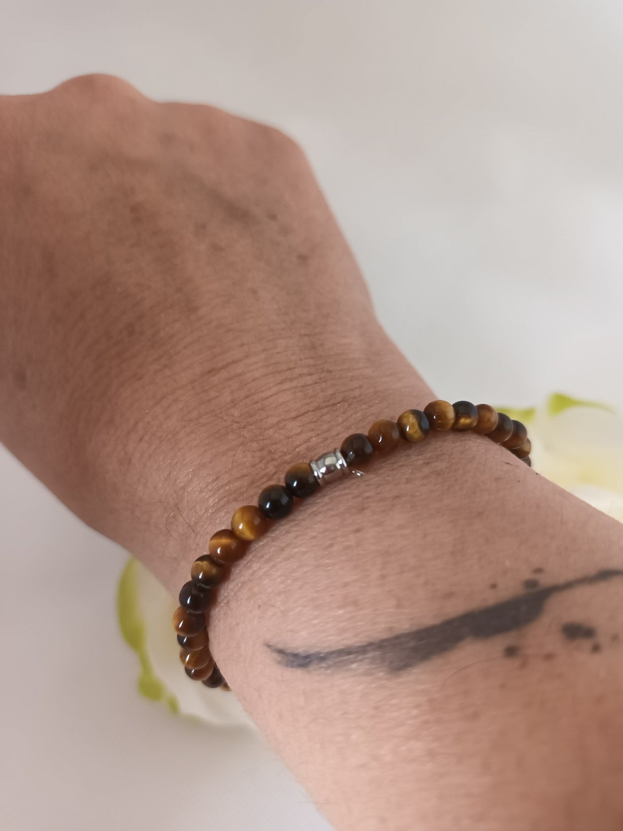 Bracelet œil de tigre 4 mm - perle acier inox - élastique 15 cm