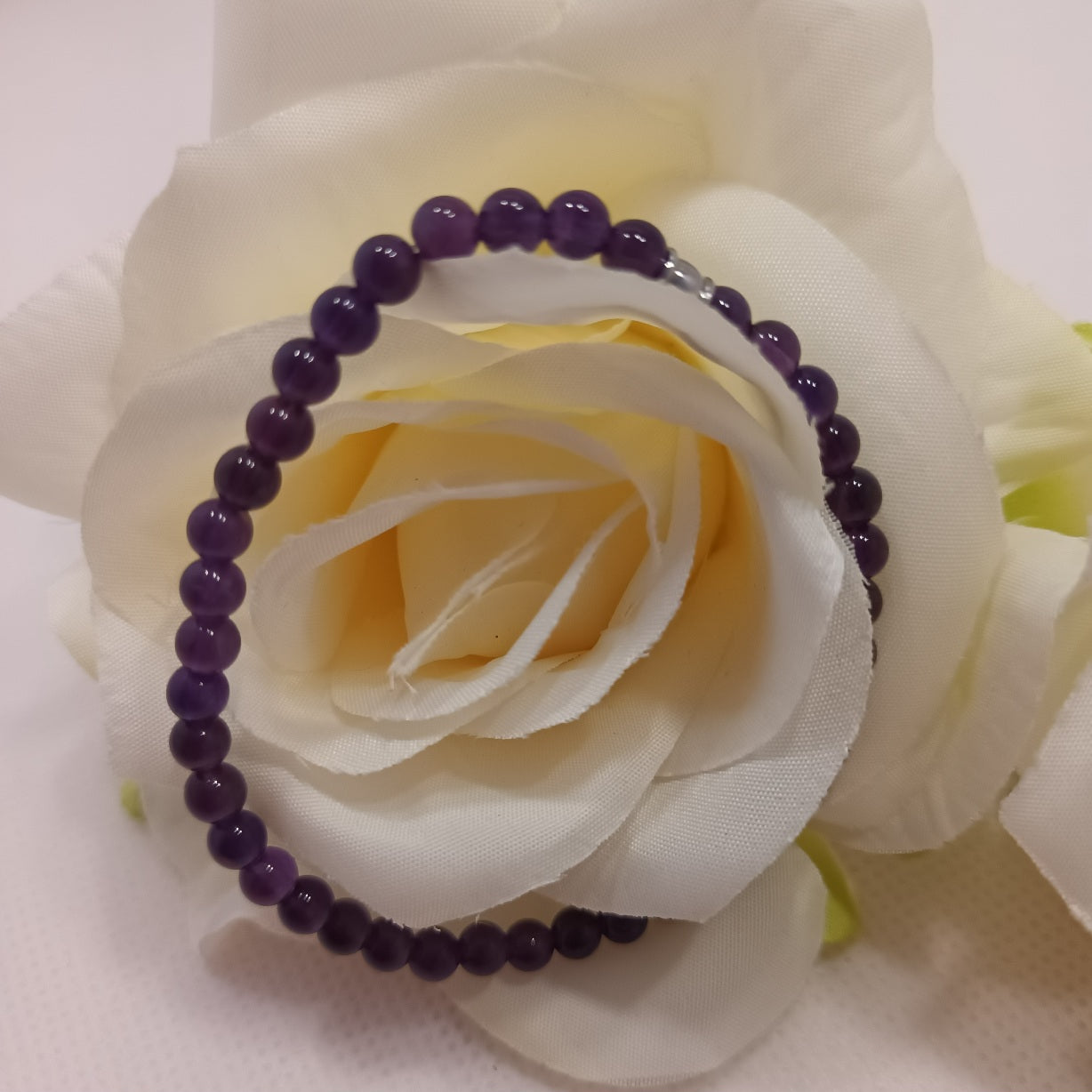 Bracelet améthyste 4 mm - perle acier inox - élastique 16 cm