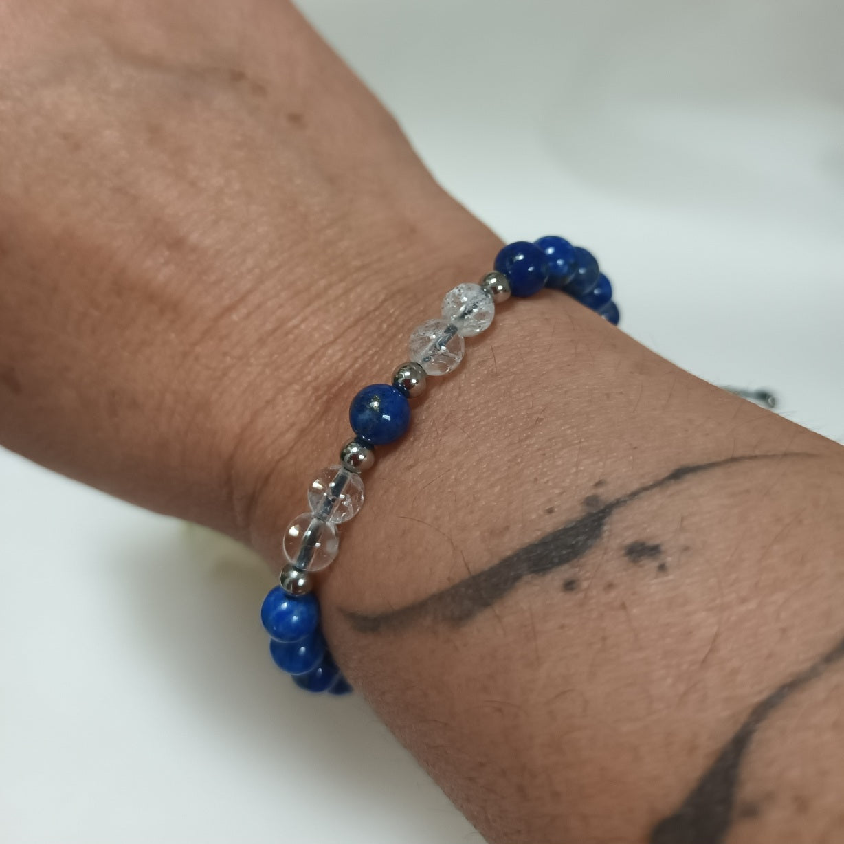 Bracelet lapis‑lazuli & cristal de roche 6 mm - perles acier inox - ajustable