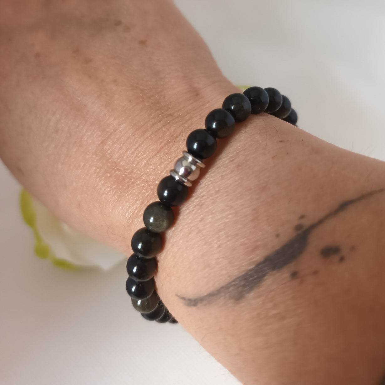 Bracelet obsidienne dorée 6 mm - perles acier inox - élastique 17 cm