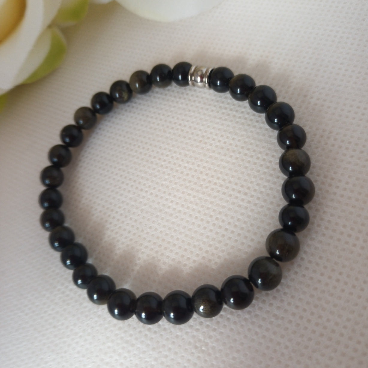 Bracelet obsidienne dorée 6 mm - perles acier inox - élastique 17 cm