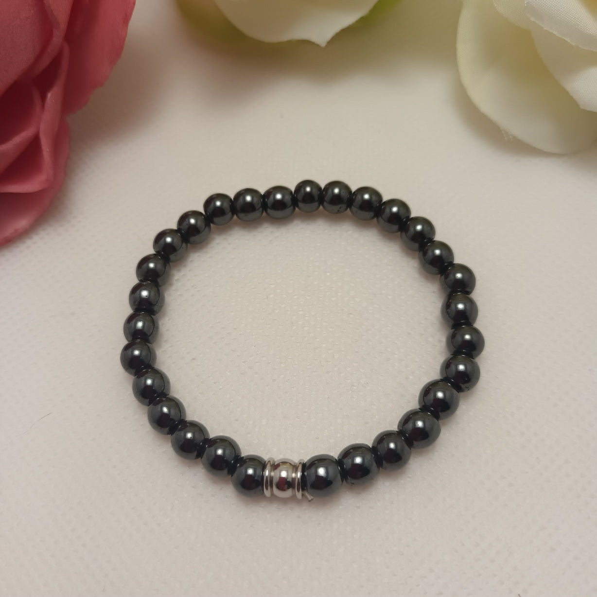 Bracelet hématite magnétique 6 mm - perle acier inox - élastique 15 cm