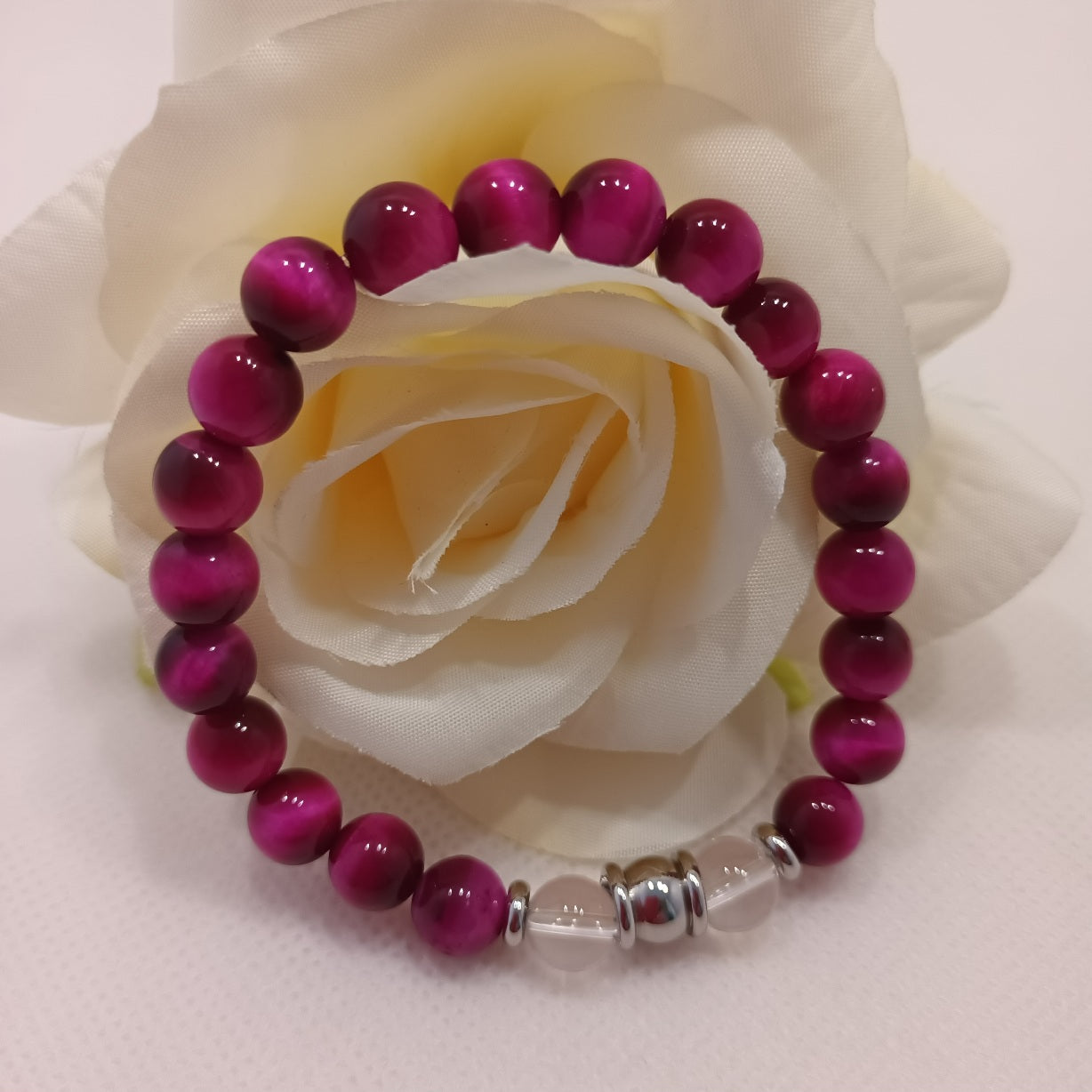 Bracelet œil de tigre teinté rose & cristal de roche 8 mm - perles acier inox - élastique 17 cm