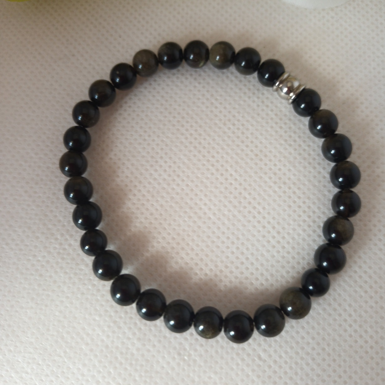Bracelet obsidienne dorée 6 mm - perles acier inox - élastique 17 cm