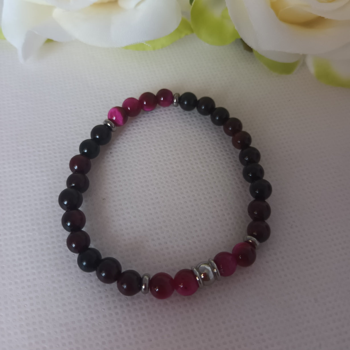 Bracelet bois et œil de tigre teinté rose 6 mm - perles acier inox - élastique 16 cm