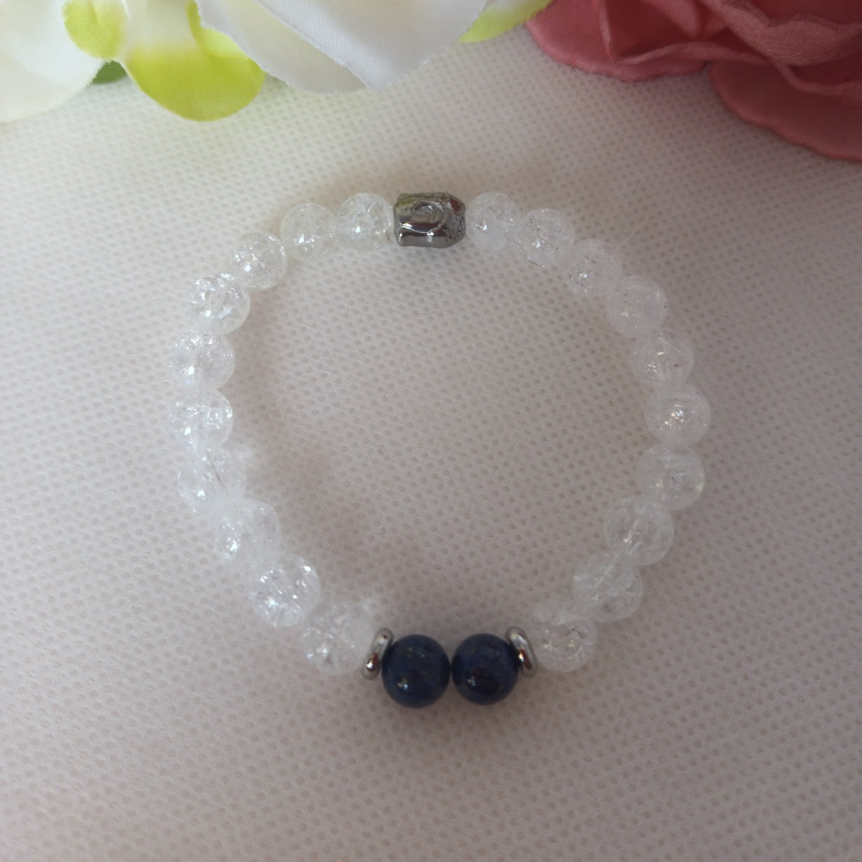 Bracelet cristal de roche et lapis‑lazuli 8 mm - bouddha acier inox - élastique 17 cm