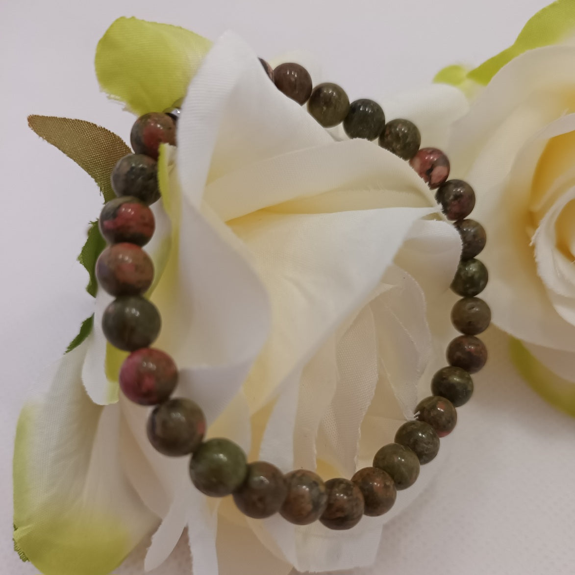 Bracelet unakite 6 mm - perle acier inox - élastique 16,5 cm