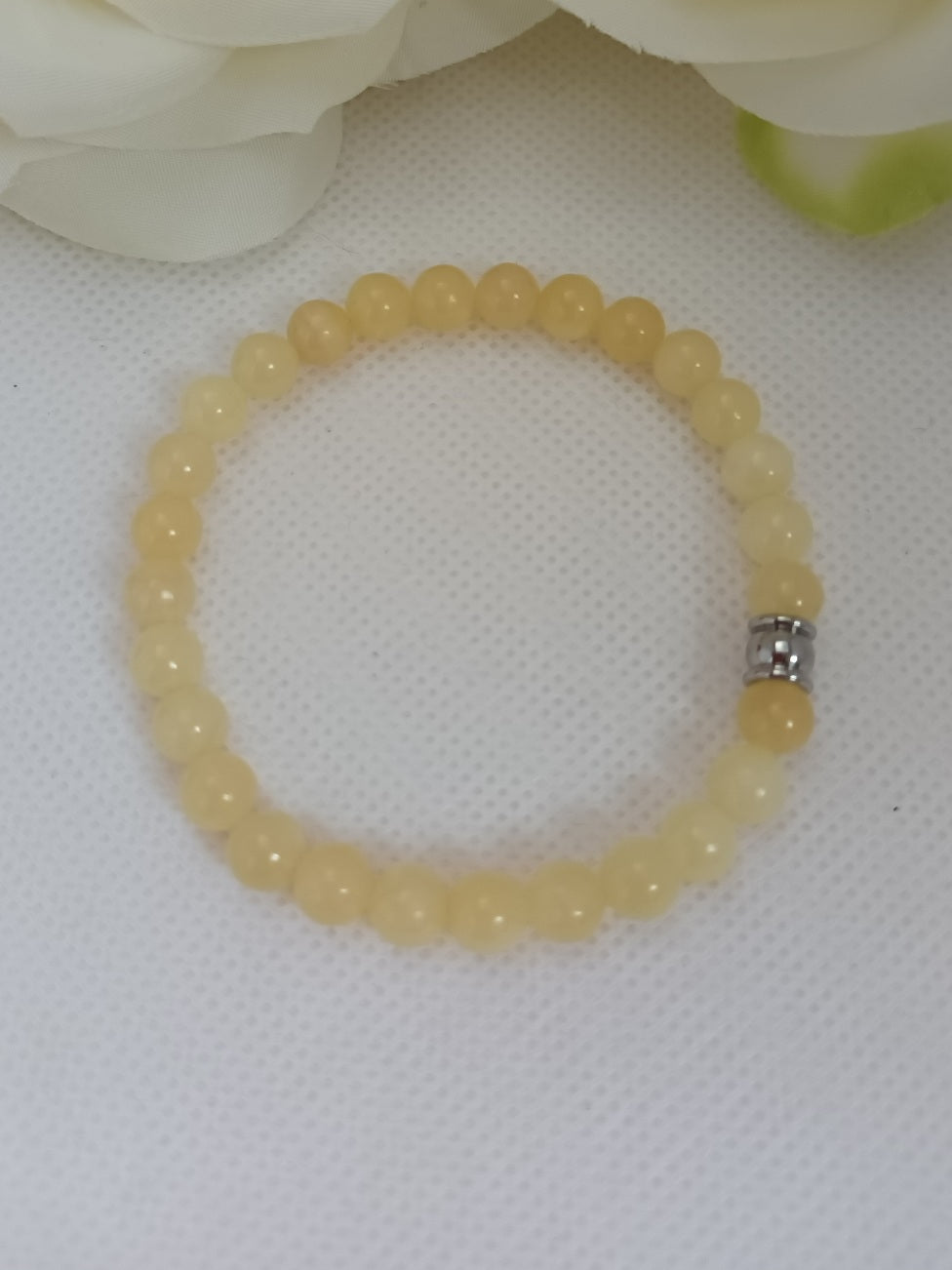 Bracelet calcite jaune 6 mm - perle acier inox - élastique 16 cm