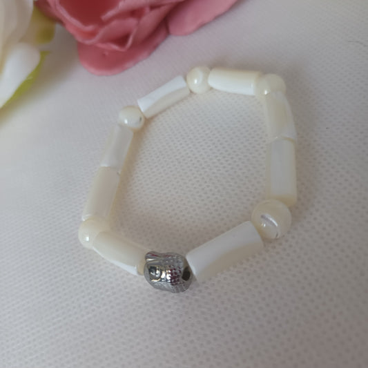 Bracelet nacre naturelle - breloque bouddha acier inox - élastique 15 cm