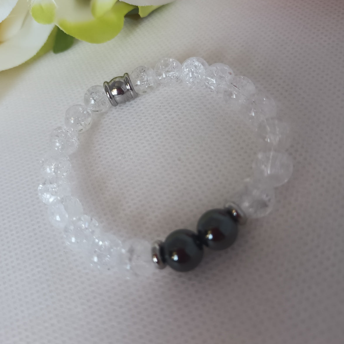 Bracelet cristal de roche et hématite magnétique 8 mm - perles acier inox - élastique 15 cm