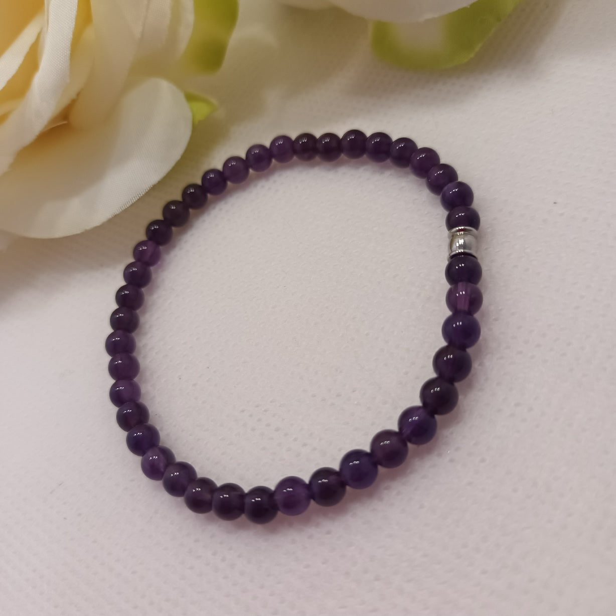 Bracelet améthyste 4 mm - perle acier inox - élastique 16 cm
