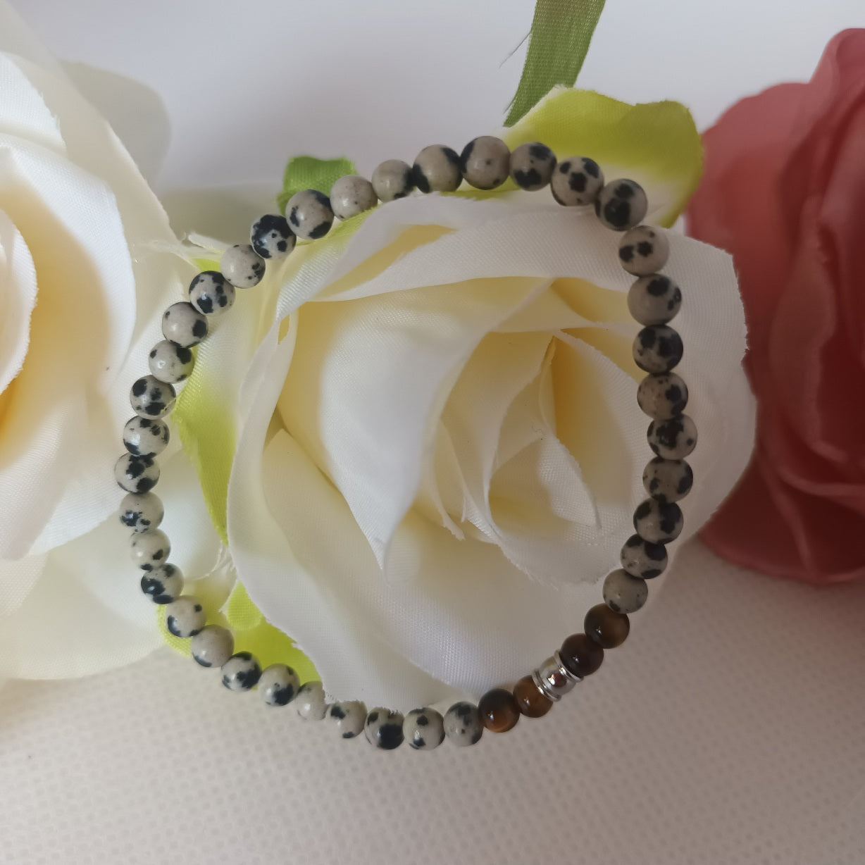Bracelet jaspe dalmatien et œil de tigre 4 mm - perle inox - élastique 16 cm