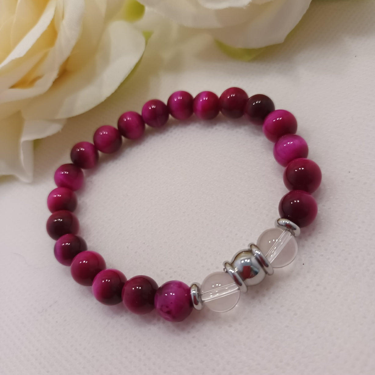 Bracelet œil de tigre teinté rose & cristal de roche 8 mm - perles acier inox - élastique 17 cm