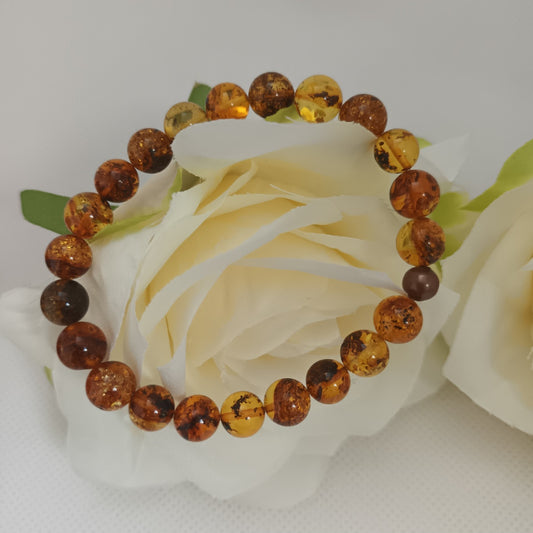 Bracelet ambre naturel 8 mm - perle laiton - élastique 15 cm