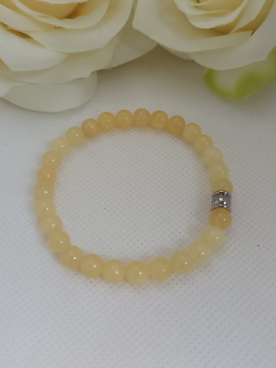 Bracelet calcite jaune 6 mm - perle acier inox - élastique 16 cm
