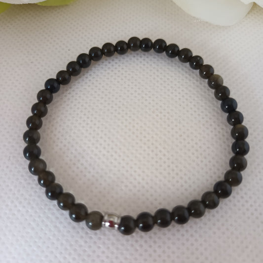 Bracelet obsidienne dorée 4 mm - perle acier inox - élastique 16 cm