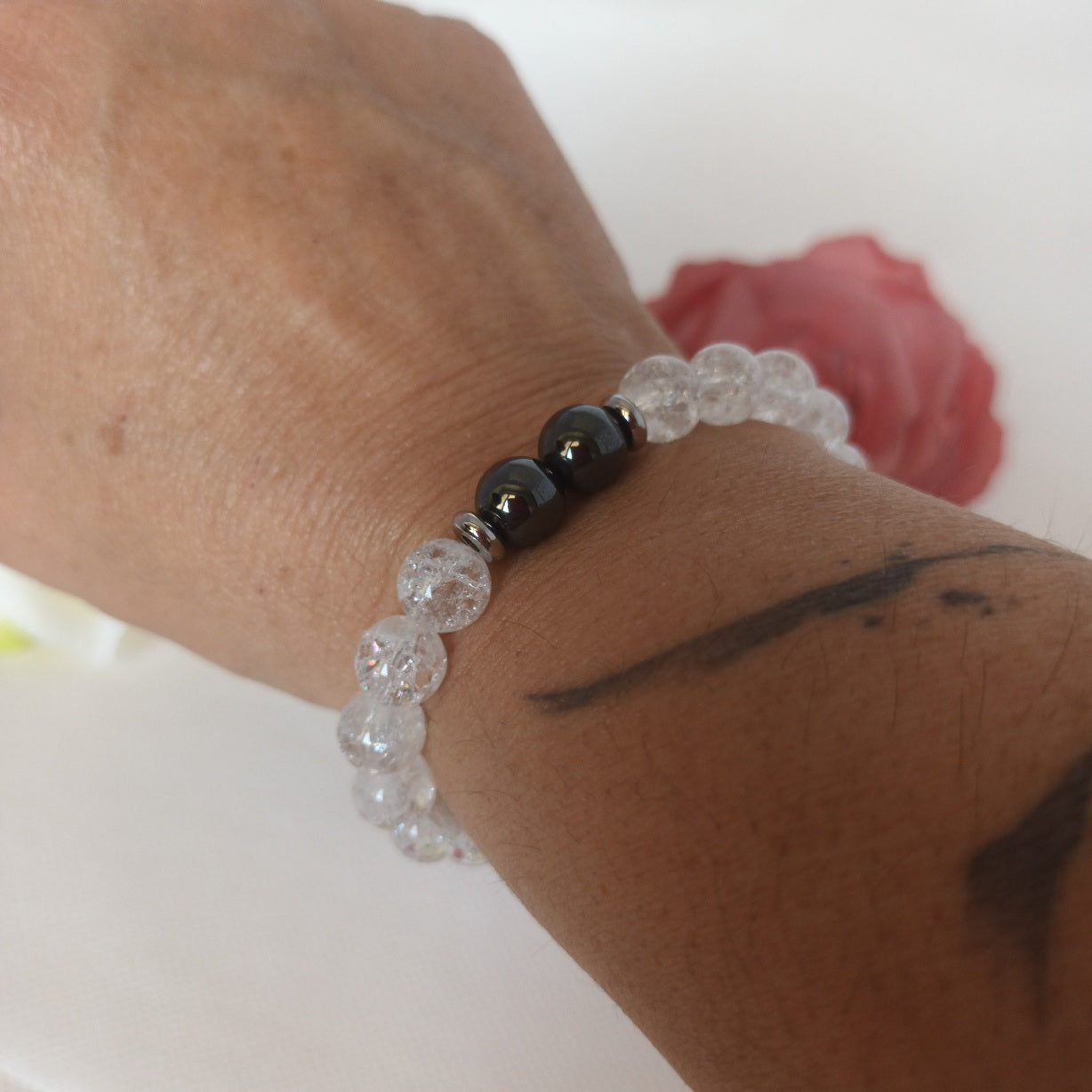 Bracelet cristal de roche et hématite magnétique 8 mm - perles acier inox - élastique 15 cm