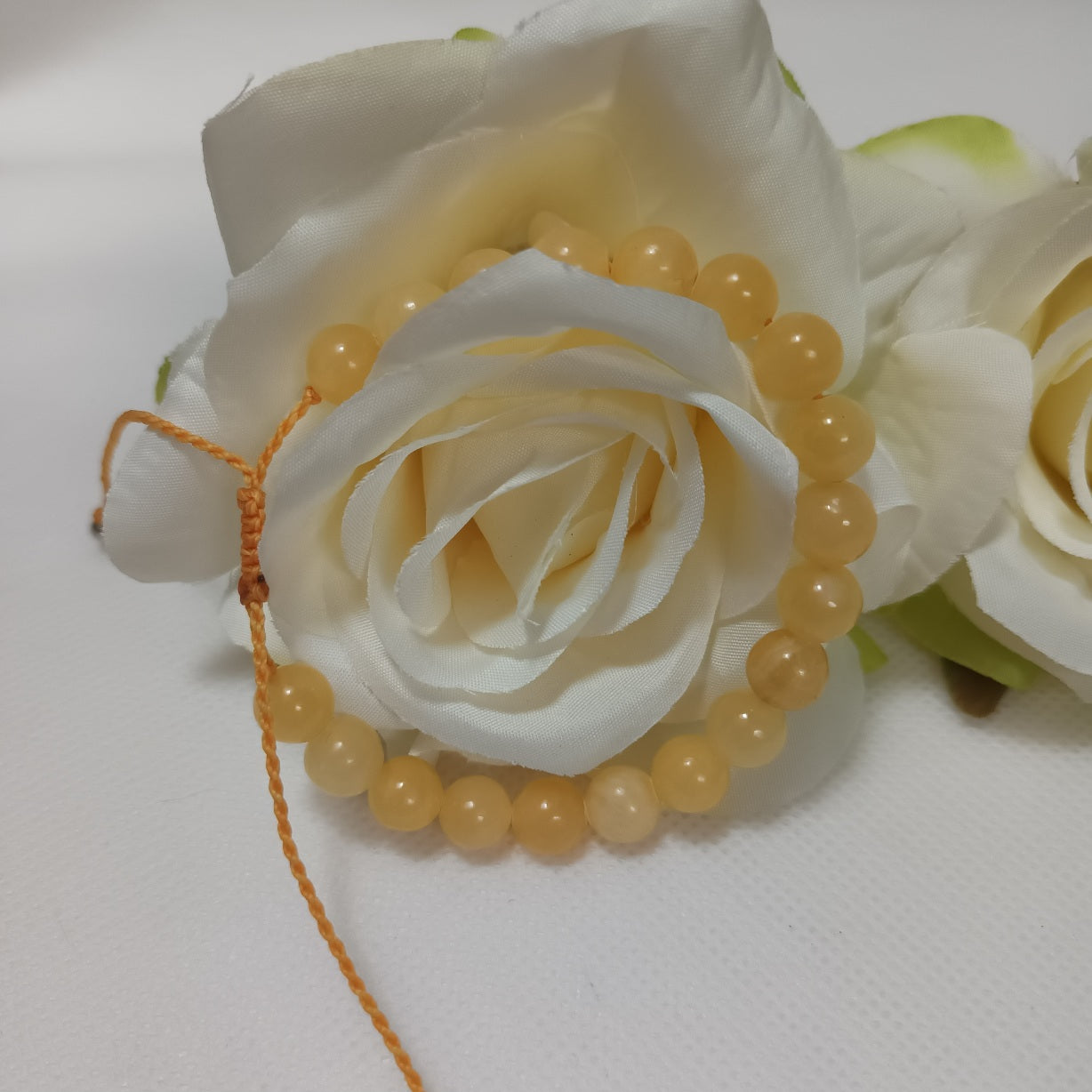 Bracelet calcite orange 8 mm - ajustable