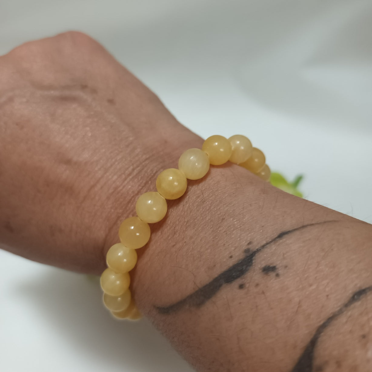 Bracelet calcite orange 8 mm - ajustable
