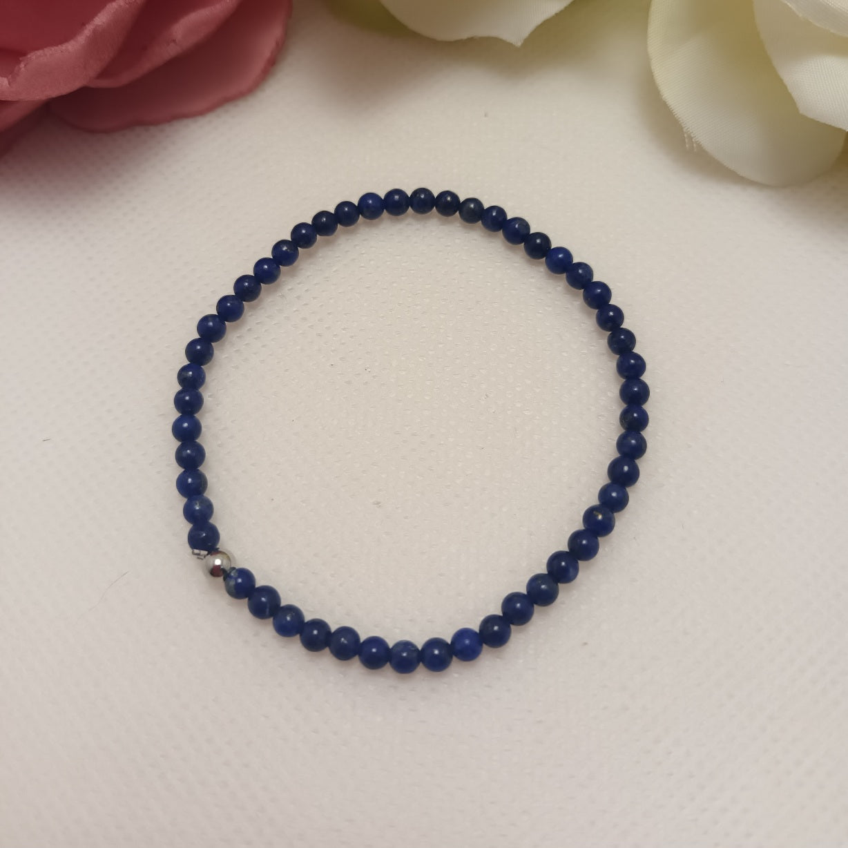 Bracelet lapis‑lazuli 4 mm - perle acier inox - élastique 16 cm