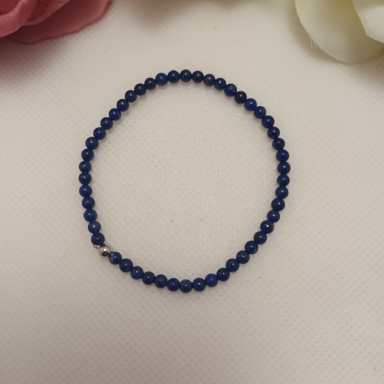 Bracelet lapis‑lazuli 4 mm - perle acier inox - élastique 16 cm