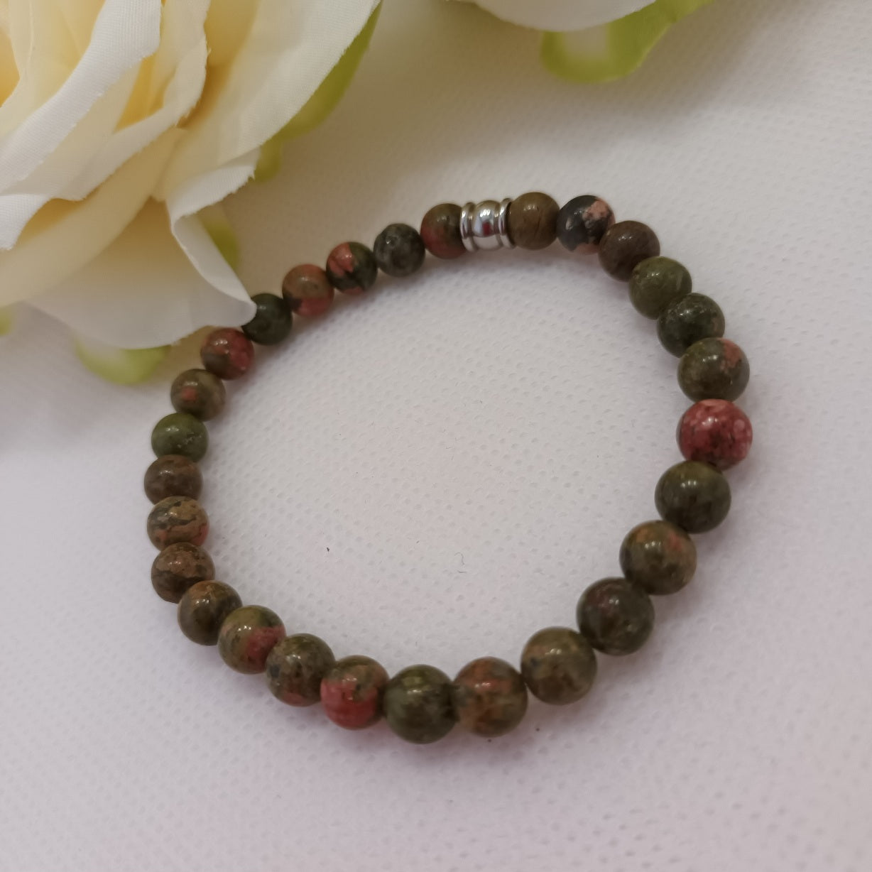 Bracelet unakite 6 mm - perle acier inox - élastique 16,5 cm