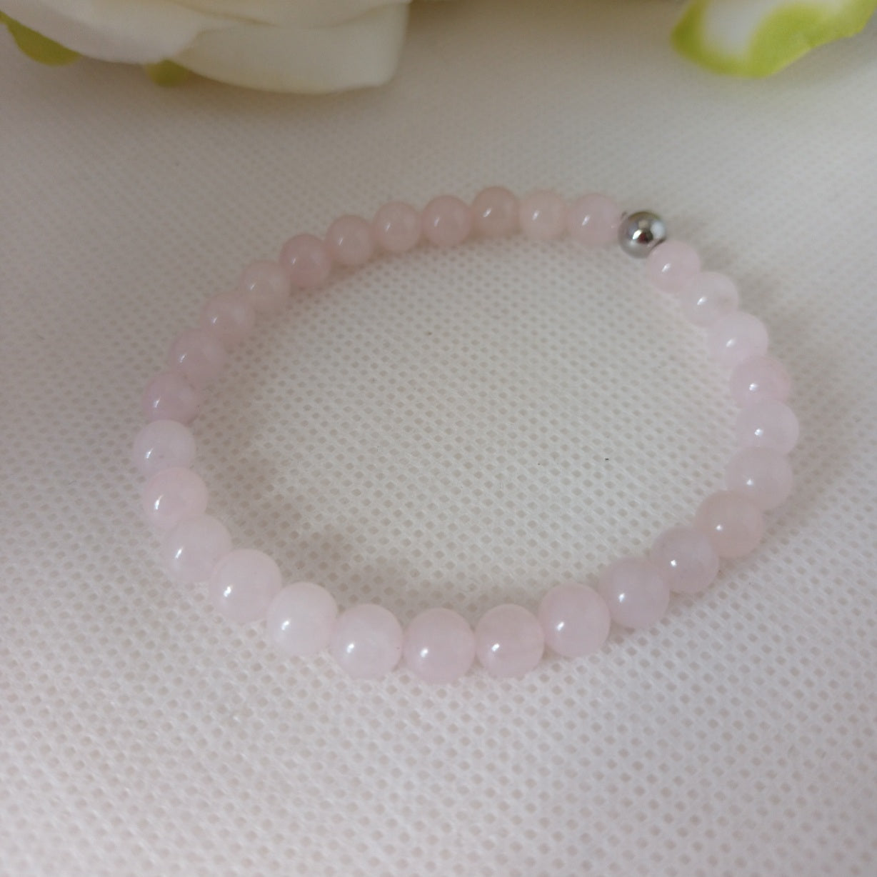 Bracelet quartz rose 6 mm - perle acier inox  élastique 16,5 cm