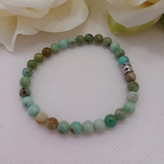 Bracelet turquoise de Mongolie 6 mm - perle acier inox - élastique 16 cm