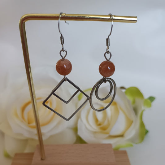 Boucles d’oreilles pierre de soleil - acier inoxydable - modèle dépareillé