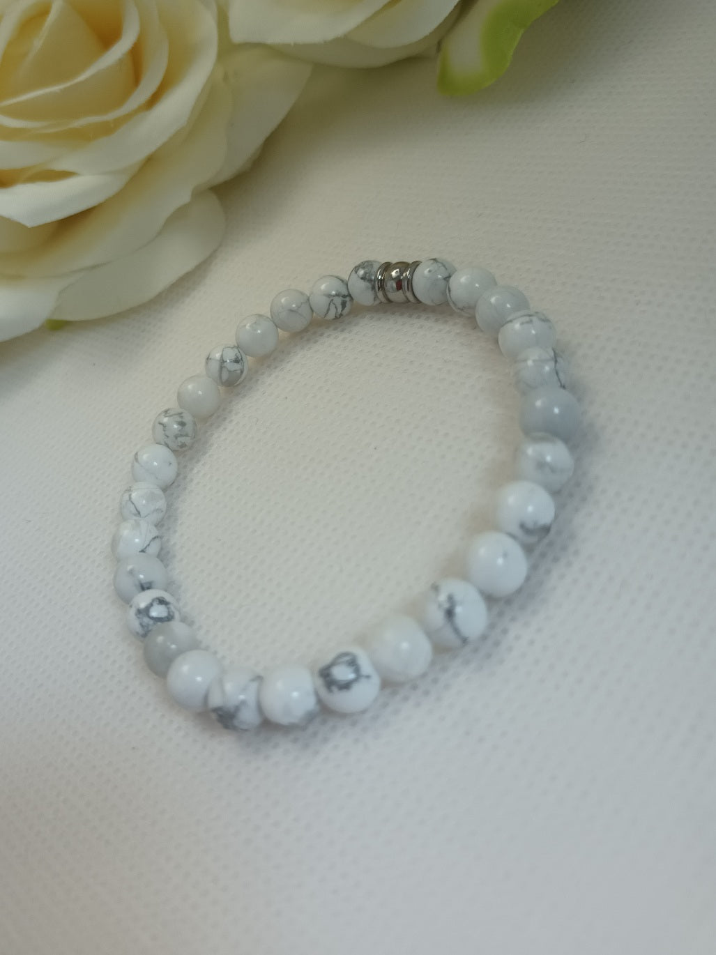 Bracelet howlite 6 mm - perle acier inox - élastique 16 cm