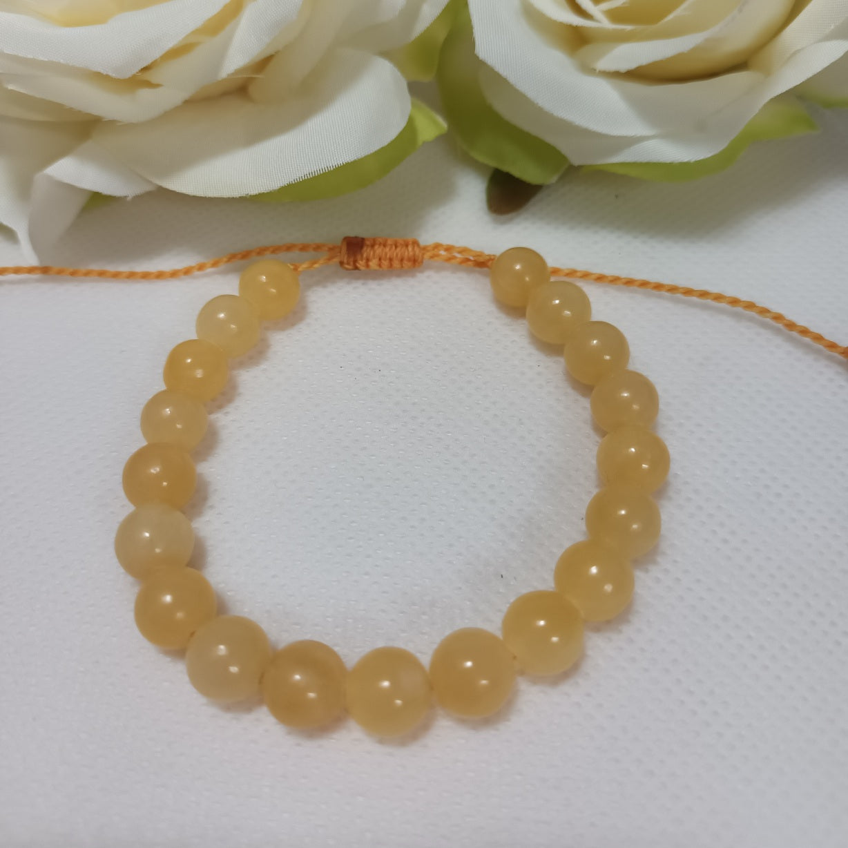 Bracelet calcite orange 8 mm - ajustable