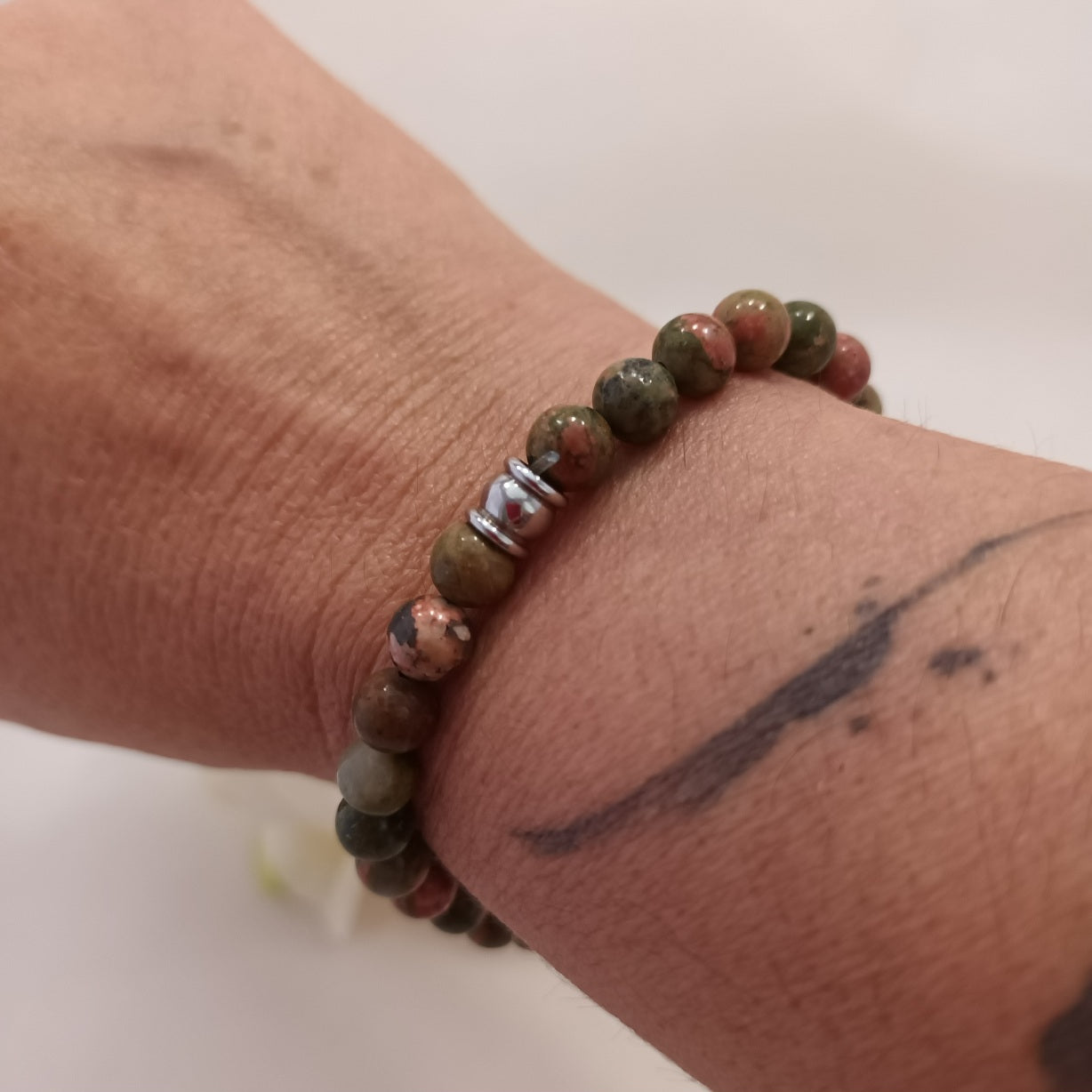 Bracelet unakite 6 mm - perle acier inox - élastique 16,5 cm