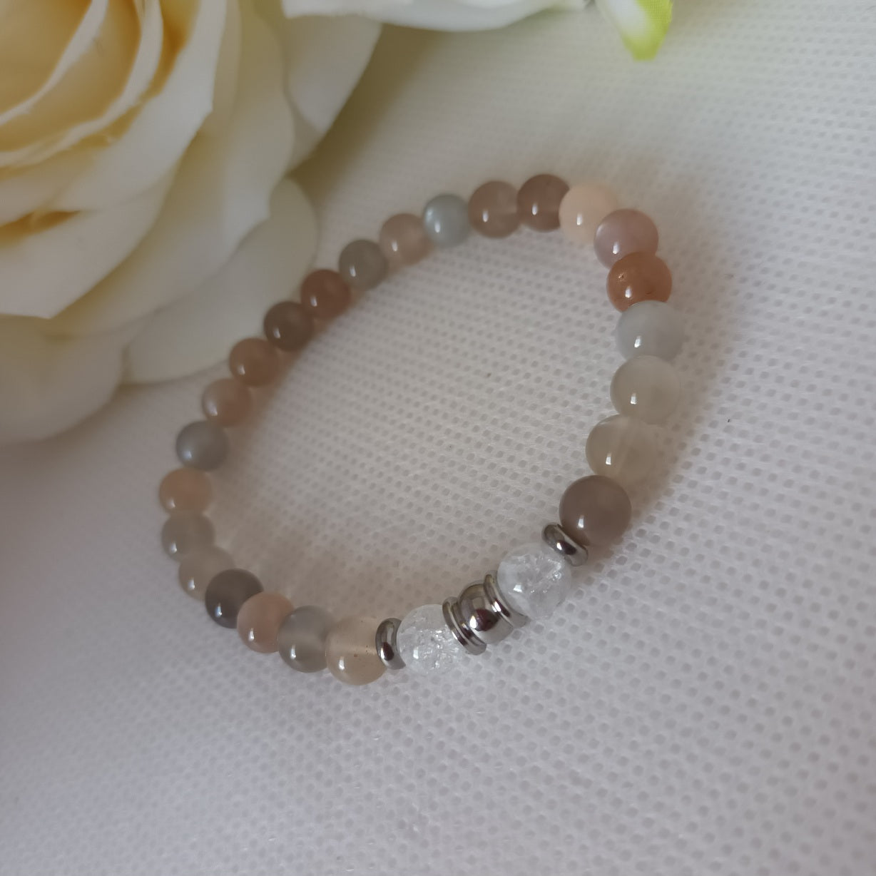 Bracelet pierre de lune multicolore et cristal de roche 6 mm - perles acier inox - élastique 15 cm