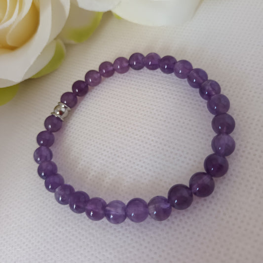 Bracelet améthyste 6 mm - perle acier inox - élastique 16 cm