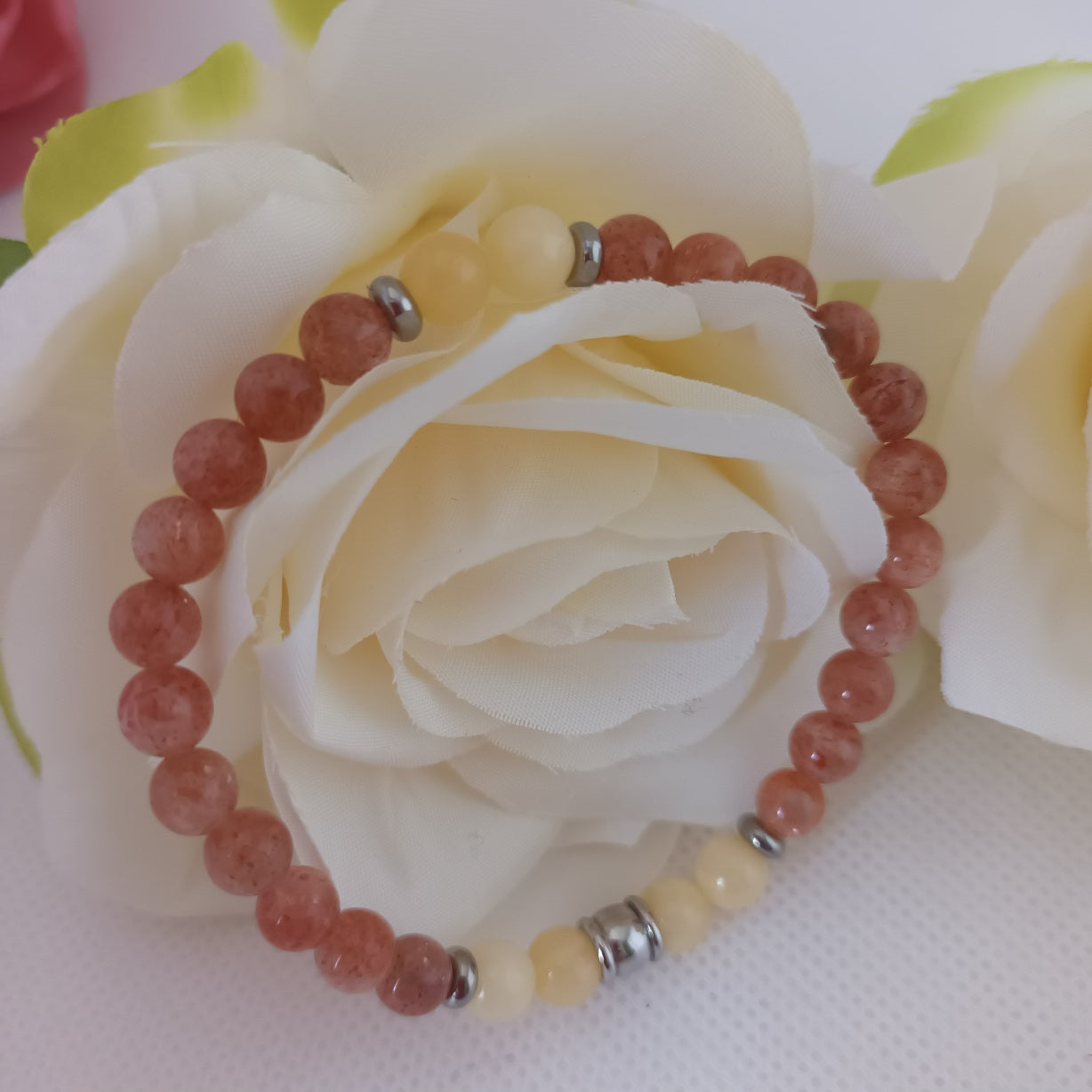 Bracelet pierre de soleil et calcite orange 6 mm - perles acier inox - élastique 16,5 cm